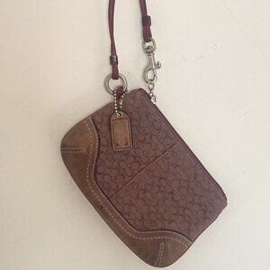 Burgundy and Tan Coach Wristlet
